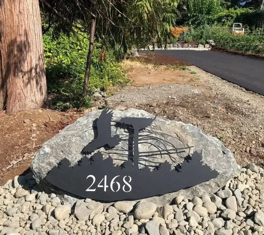 Address sign on boulder