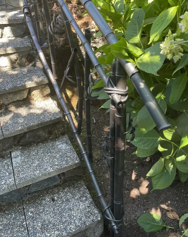 Handrail post and rail detail on the stone stair