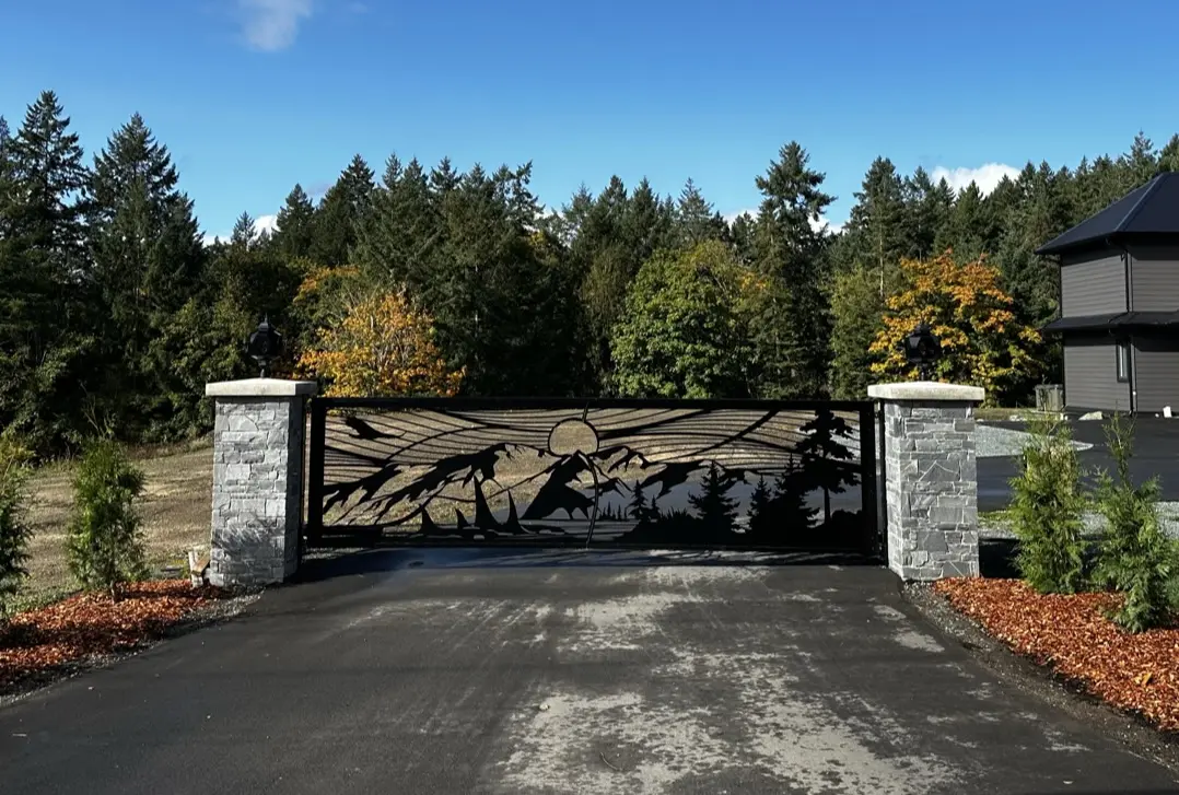 Mountain silhouette driveway gate