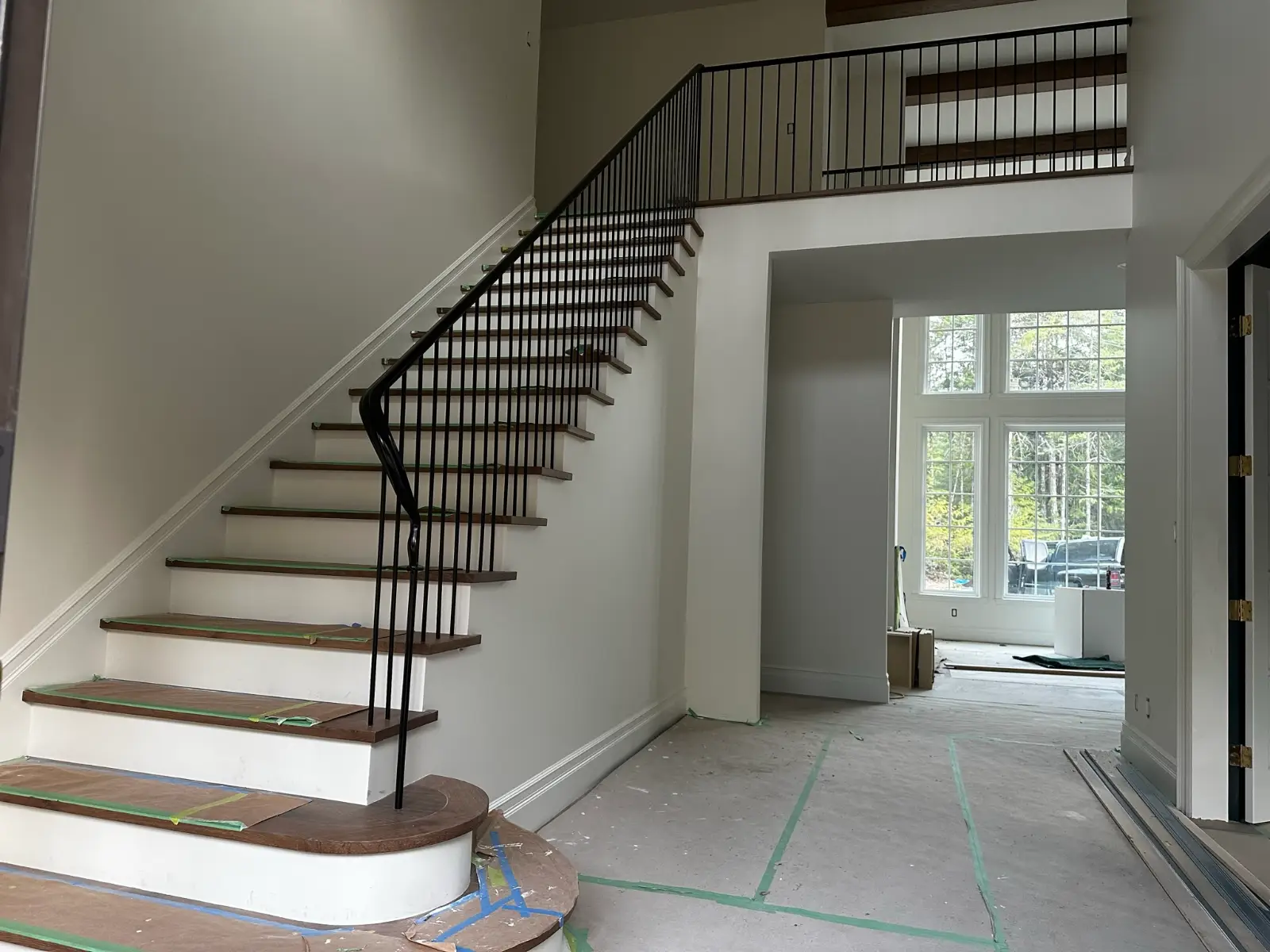 Curved stair with steel railing